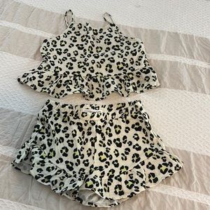 Never been worn two piece leopard tank and short set